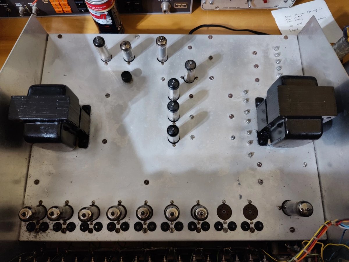 Restored EC-1 chassis interior, showing nine 6U8 op-amp tubes, bus bars, and power supply section