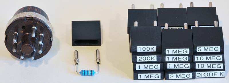Resistor and diode plug-in elements for the EC-1 patch sockets. The two-pin plug format allows rapid swapping of computing components.